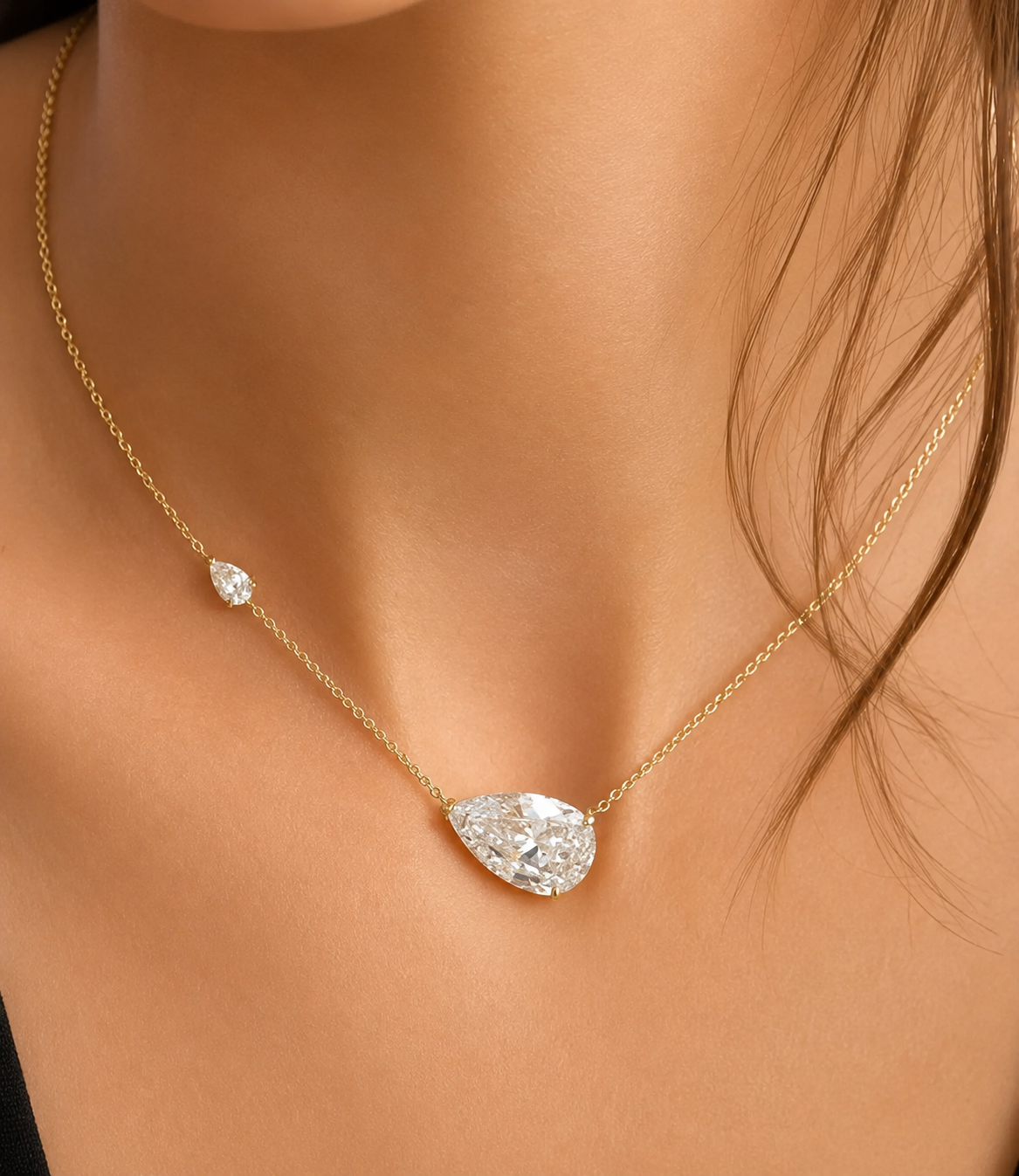 HiranyaVarna Dewdrop Pendant Necklace worn on model
